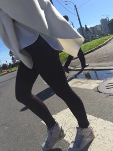 Blonde Girl With Fit Muscular Legs in Tight Black Jeans and Sneakers on a Crosswalk  - Street Creepshots Collection