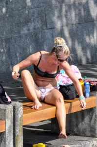 Blonde milf looking sexy in Hello Kitty bikini with nice mound and camel toe