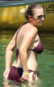 Two big boobed bikini babes in maroon bikinis