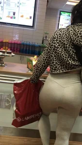 Brunette babe with a great ass in tight grey leggings
