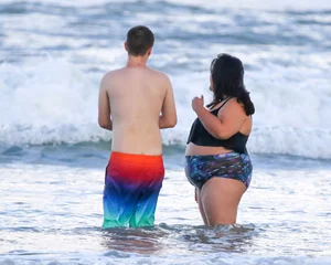 Extra thick girl at the beach in a bikini