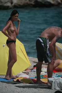 3 amazing topless girls on a nudist beach