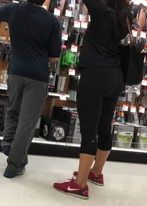 Big booty brunette milf shopping in leggings
