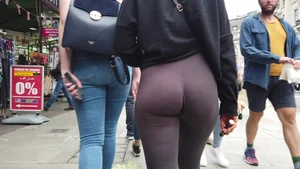 Blonde with an amazing jiggly ass in leggings walking