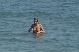 Girls on a nude beach in Sitges, Spain
