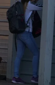 Girl next door teen walking to car in various tight jeans