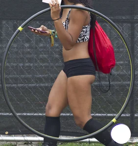 Sexy black teen hula hoop girl in tiny black shorts showing her cheeks