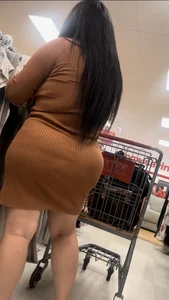 Meaty latina in dress