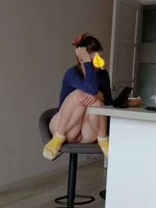 Candid Girl in Panties and Yellow Socks Sitting on a Barstool