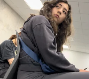 College Vpl Latina In Dark Grey Leggings Going Up The Stairs