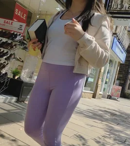 Cute teen in lilac leggings