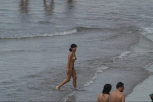 Girls on a nude beach in Sitges, Spain