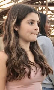 Cute candid teen with wavy hair