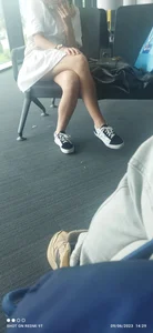 Girls with hot legs sitting in public places