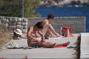 Nude girls on a beach in Hvar, Croatia