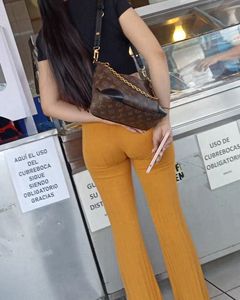 Perfect body pettite in tight orange leggings (OC).