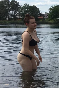 Big boobed babe at the lake in a black thong with blonde friend