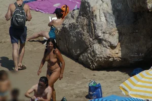Girls on a nude beach in Sitges, Spain