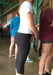 Big booty babe at a baseball game in tight leggings