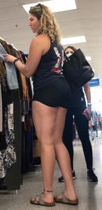 Tall thicc curly blonde in tight black shorts 0927