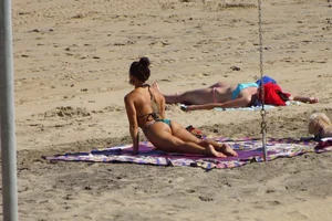 Sexy mix of girls in bikinis at the beach