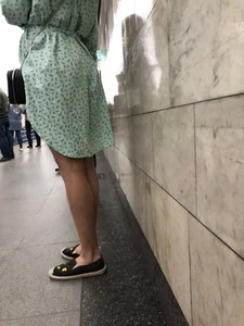 Girl in a Dress With Sexy Legs in Subway and on a Street