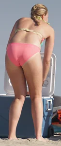 Thick blonde bikini babe on the beach