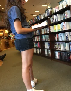 Teen in jean shorts at the library creepshots