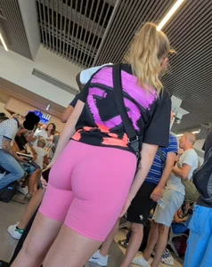 Hot airport girl wearing pink tight short