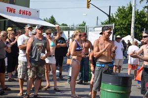 Hot ass Canadian babe in a bikini dancing at a concert