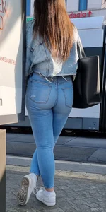 ass in tight blue jeans