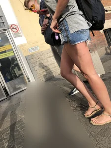 Girl in Denim Mini Shorts and Sandals With Sexy Legs And Feet Street and Subway Photos