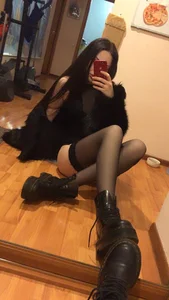 Girl With Very Thin Legs in High Platform Boots And Stockings Sitting on the Floor Mirror Selfie