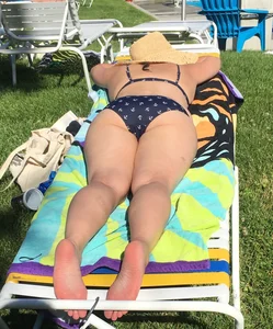 Chubby wife chilling on sunbed creepshot