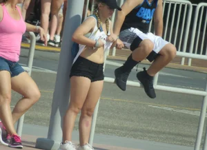 Couple of babes standing around in shorts