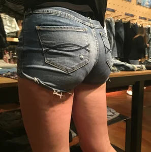 Great Round Ass in Tight Denim Jeans and Hot Bare Legs - Store Closeup Creepshots Gallery