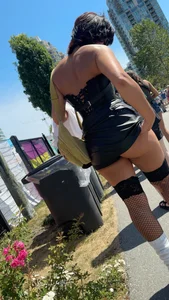 Cheeks hangin’ out of little black skirt