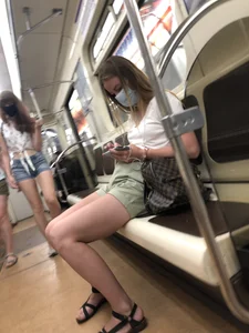 Girl in Shorts, Sandals and a Mask With Hot Legs in the Subway Train Creepshots