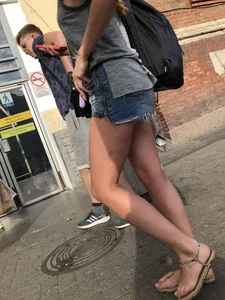 Girl in Denim Mini Shorts and Sandals With Sexy Legs And Feet Street and Subway Photos