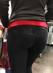 Pretty girl shopping with boyfriend in leggings with a nice ass