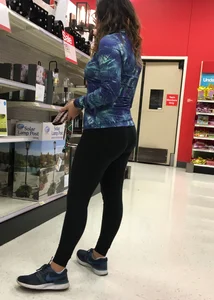 Brunette with glasses and nice ass shopping at Target in leggings