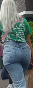 Blonde girl wearing blue jeans with a great ass street creepshots