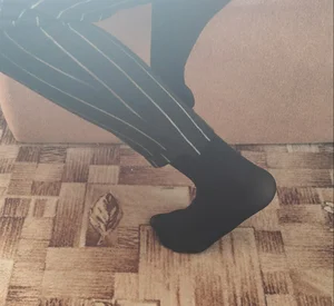 Teen College Girl's Shoeless Feet in Black Pantyhose
