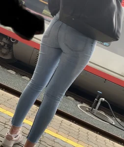 Tight jeans ass at train station