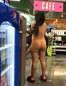 Latina with hard nipples and a big booty in tight spandex shorts outfit