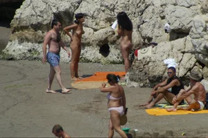 Girls on a nude beach in Sitges, Spain
