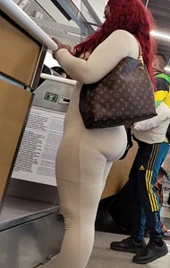 White body suit , booty jus hangin