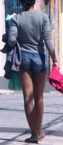 Black booty in denim shorts with slight vpl