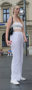 Long blonde braless in a white outfit (many pictures)