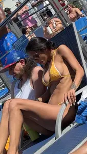Fake tits in a bikini